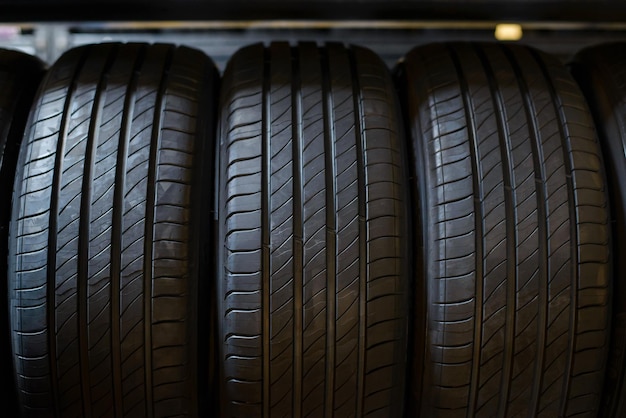 A new tire is placed on the tire storage rack in the car\
service center be prepared for vehicles that need to change\
tires