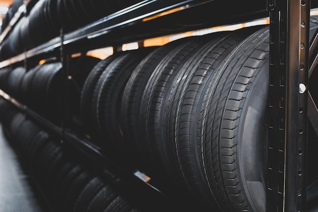 A new tire is placed on the tire storage rack in the car\
service center be prepared for vehicles that need to change\
tires