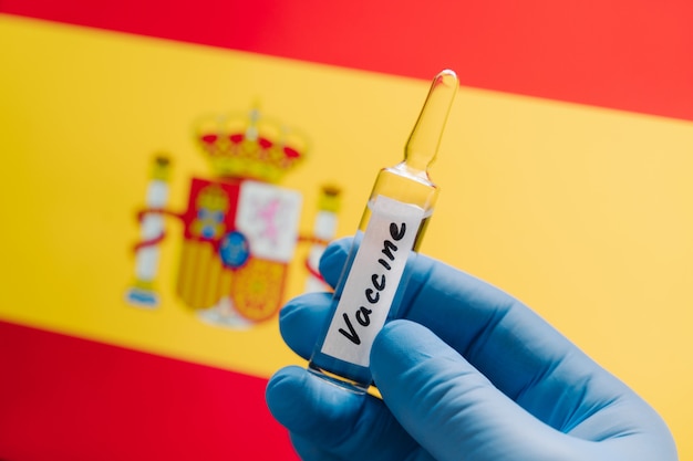 New vaccination against coronavirus. Ways how to overcome Covid-19 spreading in Spain. 2019-ncov. Bilological hazard. Contagious disease