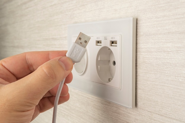 New wall outlet socket with USB 5V 2.1 A included. For convenience, the mobile charger or smartphone in the concept of modern life.