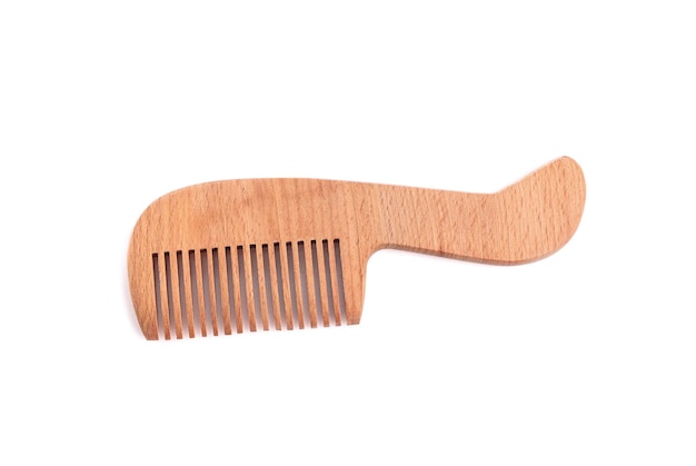 New wooden hair comb on white background top view