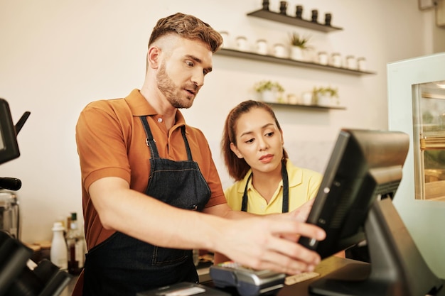 Photo new worker in coffeeshop