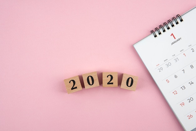 Photo new year 2020 calendar on pink background