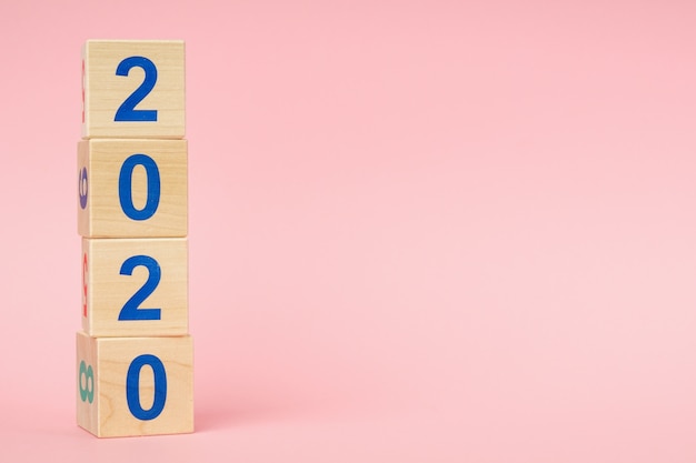 New year 2020 concept. Wooden block cube with number