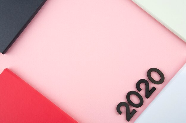 New Year 2020 diary on pink background