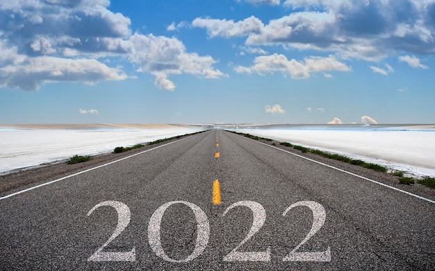 New year 2022 or straightforward concept Empty asphalt highway