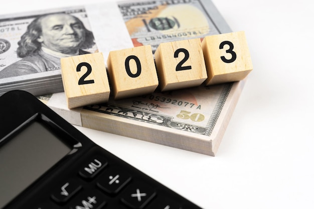 New Year 2023 With American Dollar and Calculator