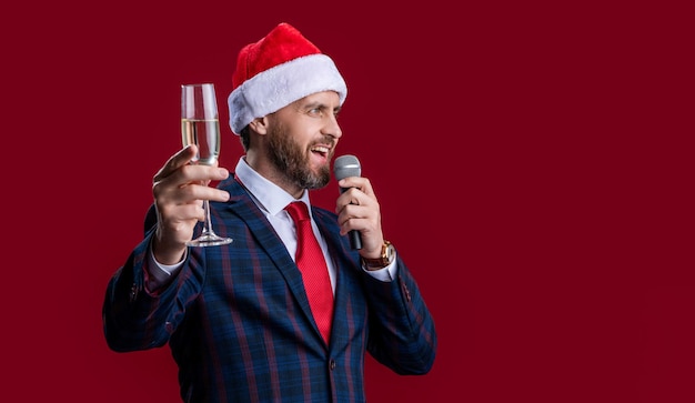 New year businessman cheering copy space new year businessman\
in santa hat cheering