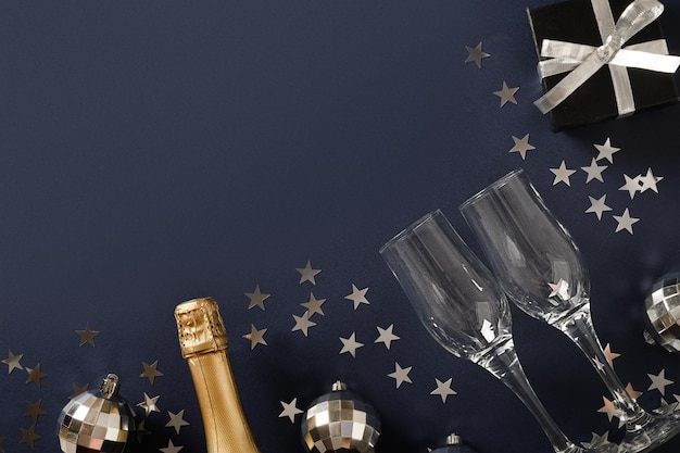 Regalo di champagne di capodanno stelle lucide palle da discoteca d'argento