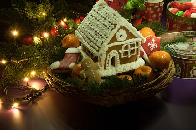 New Year Christmas cookies with tangerines and a small house