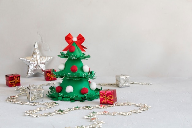 New Year composition with Christmas Tree from color paper Handmade DIY holiday decoration project