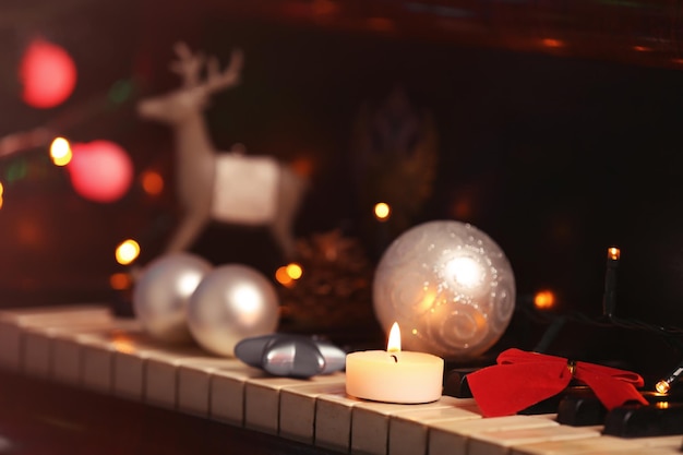 New year decorations on piano keyboard. Christmas music concept