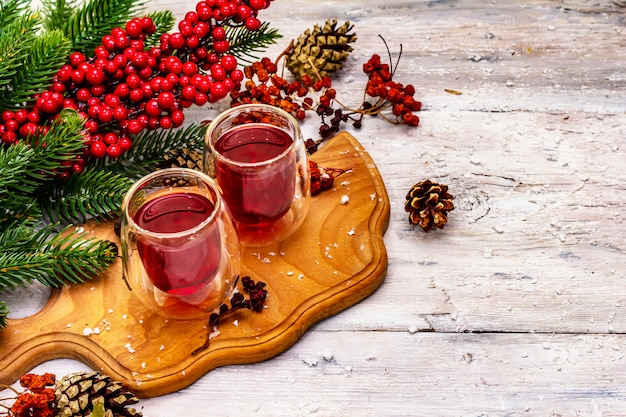 New Year Festive berries liqueur or tincture as ingredient for preparation alcohol cocktail