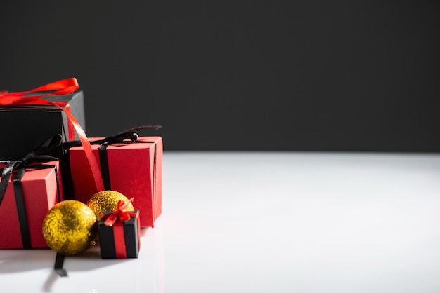 New year gifts on white table and dark background copy space