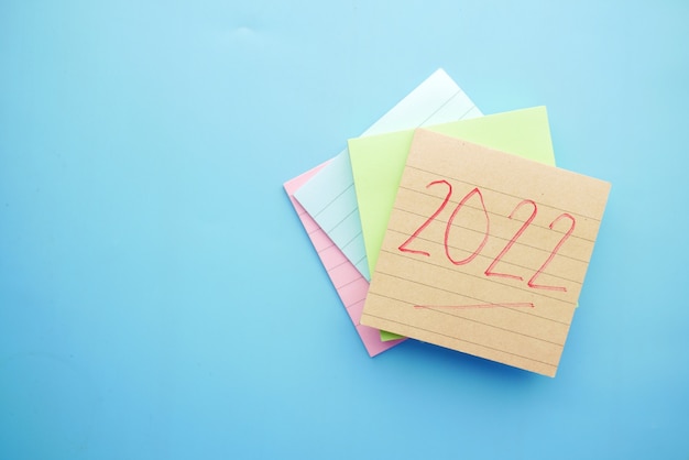 new year goals on sticky notes on blue