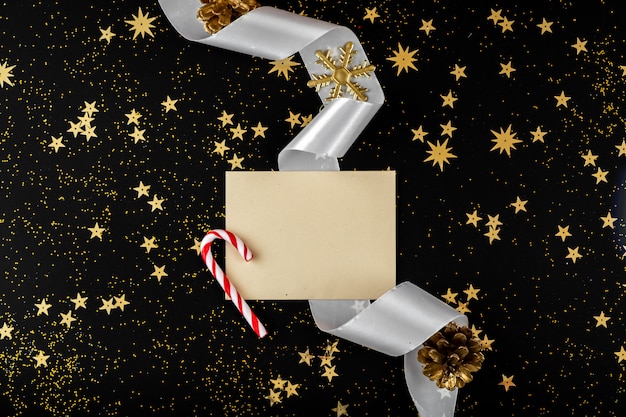 Photo new year greeting envelope lies on festive black background