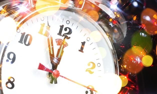 Photo new year retro style clock countdown to midnight.