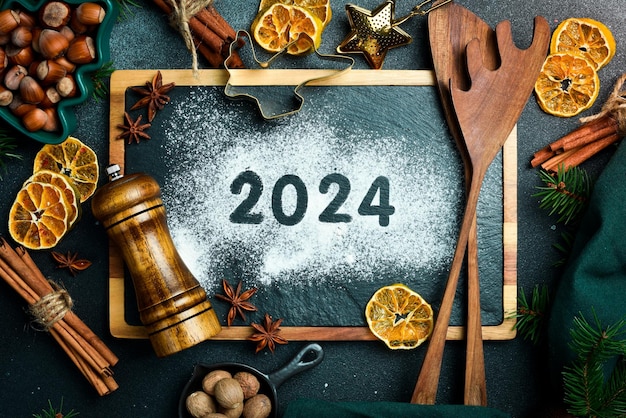 New Year's background Baking background with text 2024 New Year's card Top view Flat lay