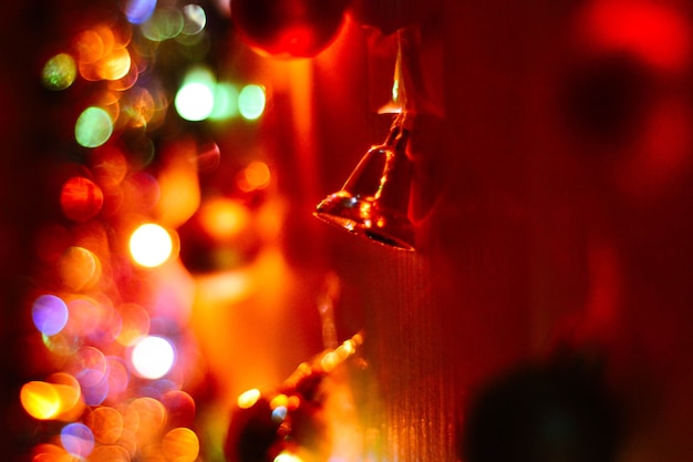 New Year's bell in a garland of bokeh