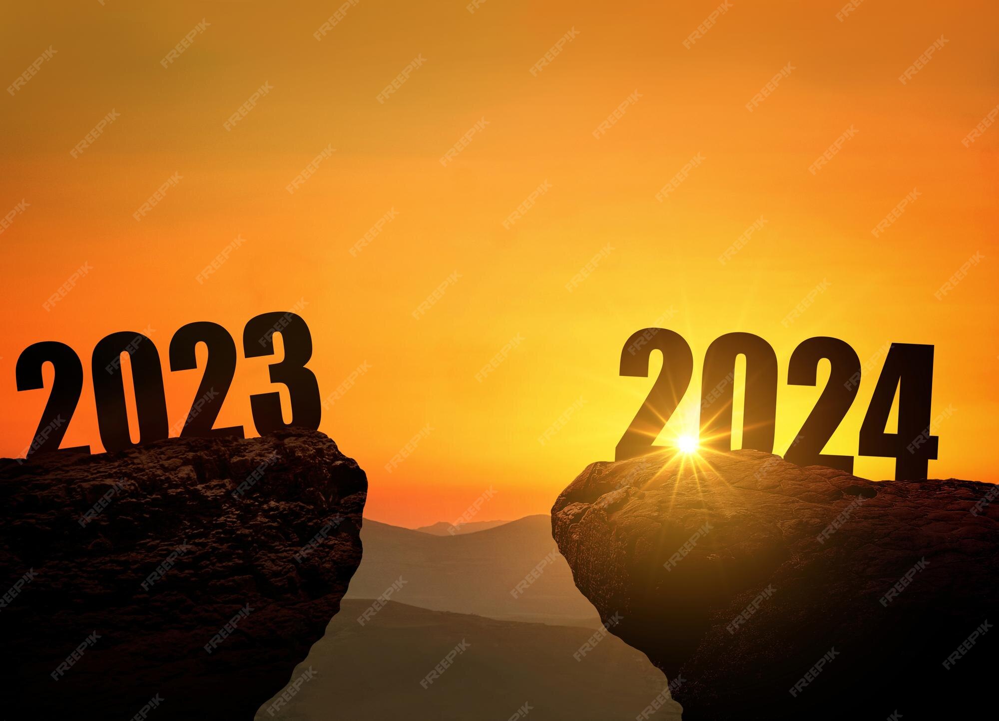 Premium Photo New year's eve 2024 on the mountain at sunset concept