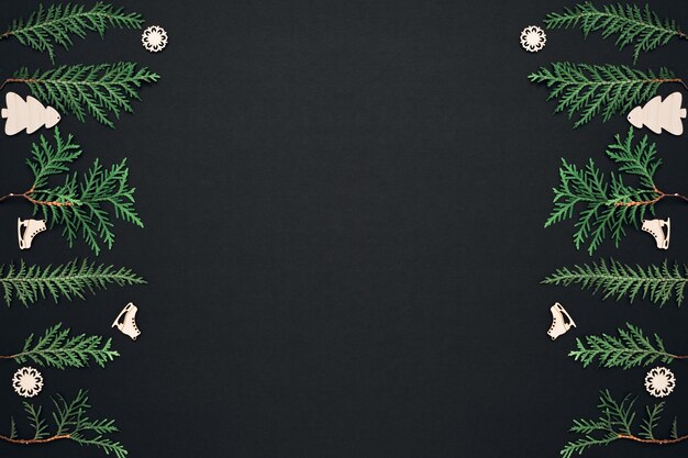 New Year's, festive decor on a black background. Copy space, flat lay, mock up, top view.