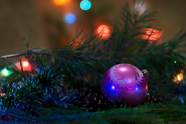 Premium Photo  A beautiful toys on the christmas tree with garland