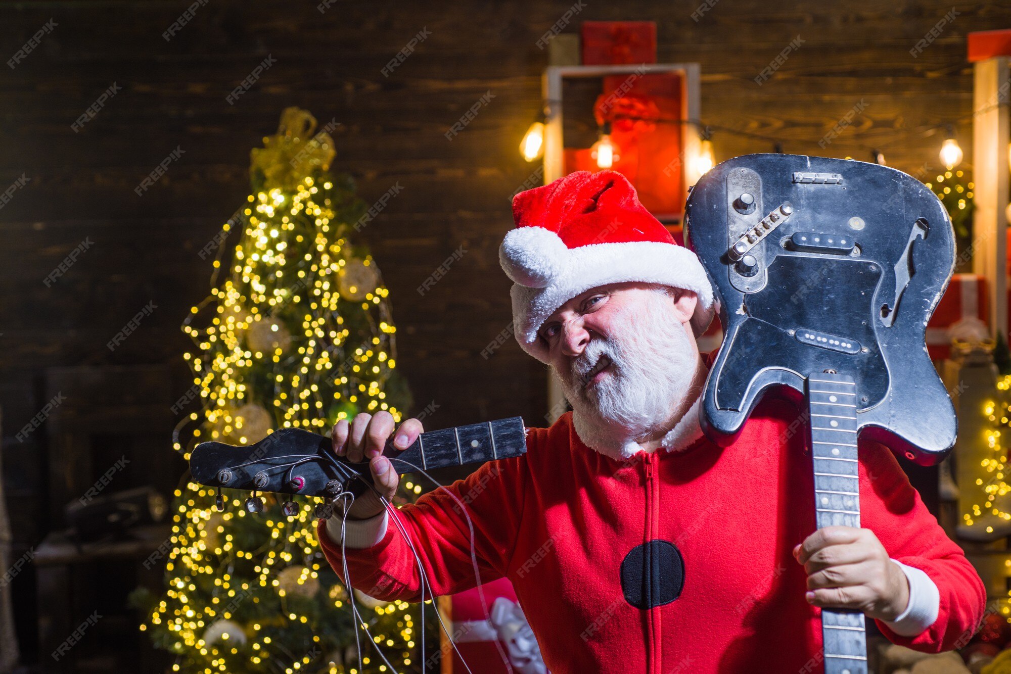 new-year-santa-claus-with-broken-electric-guitar-happy-santa-christmas-time-christmas-santa-claus_378307-3294.jpg