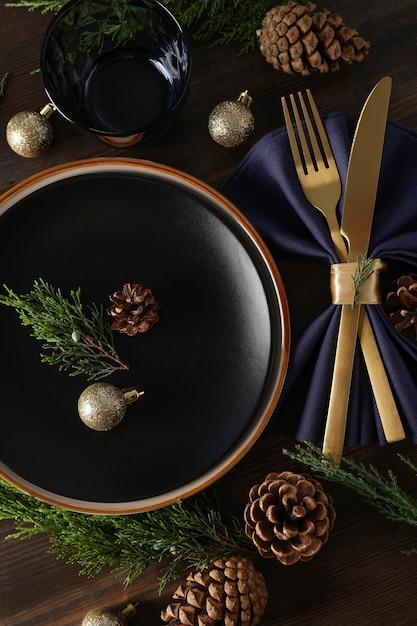 New Year table setting on wooden background.