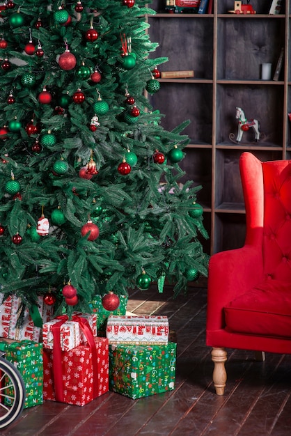 new year tree with decoration red sofa bookshelf present boxes