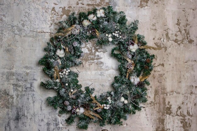 New Year wreath on the brick wall