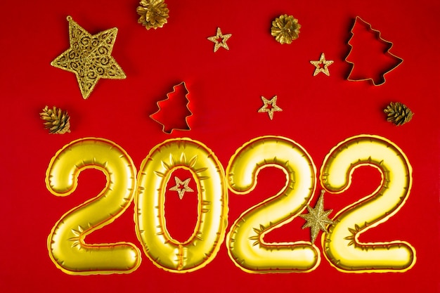 New years concept red background with golden decorations