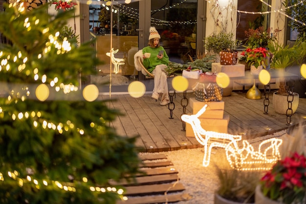 New years decorated backyard and woman alone