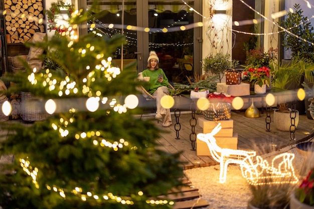 New years decorated backyard and woman alone