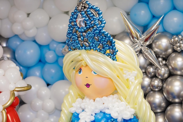 New Years figures of Santa Claus and Snow Maiden from balloons Celebrating new year christmas