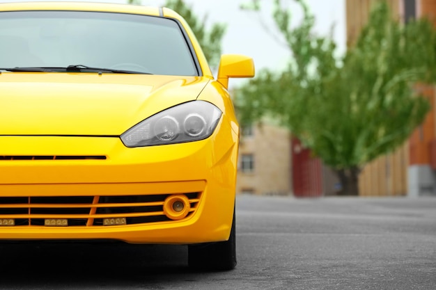 New yellow car on the road