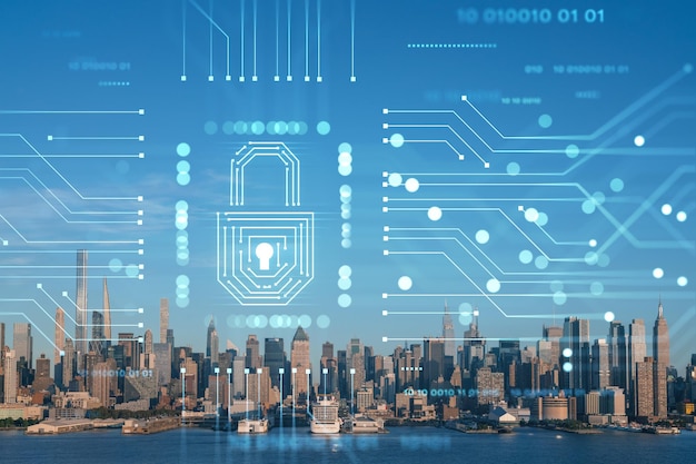 New York City skyline from New Jersey over Hudson River Midtown Manhattan skyscrapers at sunset USA The concept of cyber security to protect confidential information padlock hologram