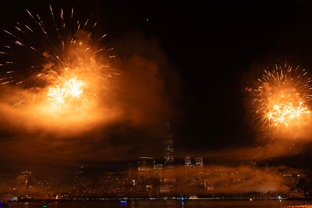 new york manhattan fireworks new york fireworks over manhattan new york city 4th of july fireworks new york city skyline manhattan with flashing fireworks independence day