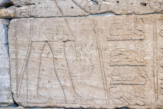 NEW YORK, USA - APRIL 23 2017 - Metropolitan Museum ruined bas relief ancient hieroglyphs on stone detail