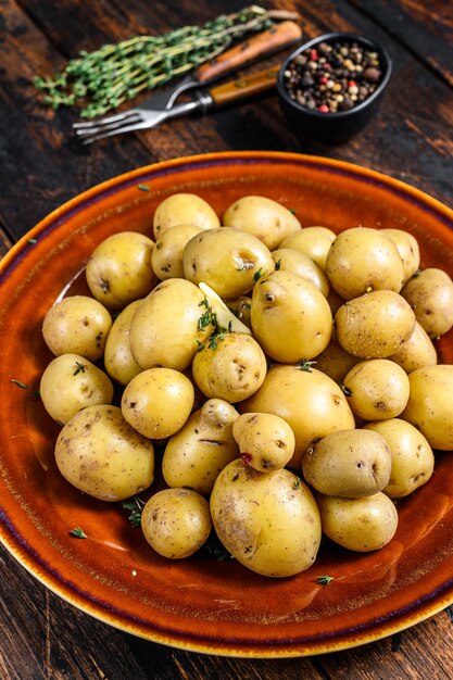 New young boiled potato with butter