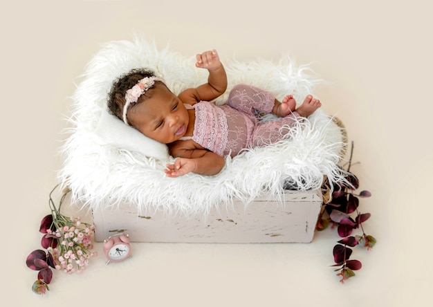 Newborn baby in cradle