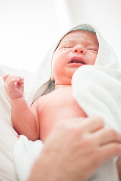 Newborn baby first bath