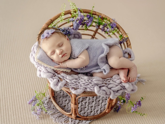 Newborn baby girl studio portrait