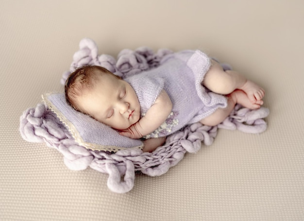 Newborn baby girl studio portrait