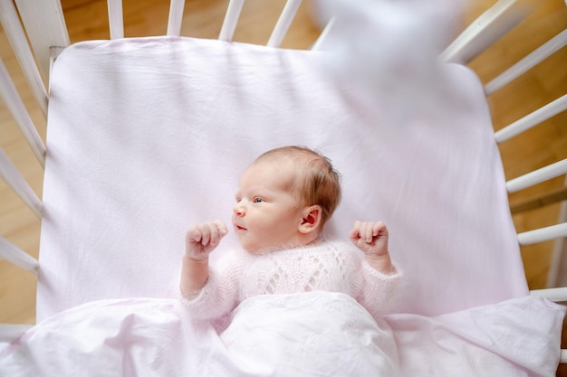 Newborn baby girl studio portrait