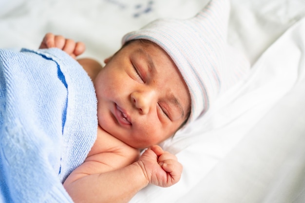 Newborn baby in the hospital first day of life