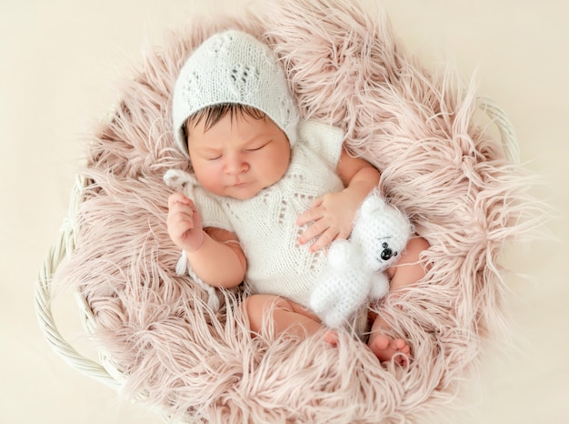 Newborn baby sleeping in the basket