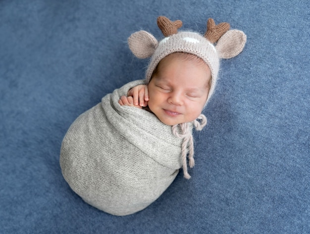 Newborn boy studio portrait