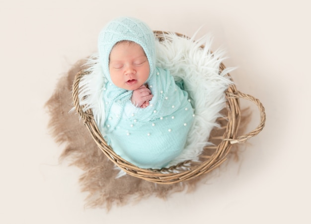 Newborn lying in basket