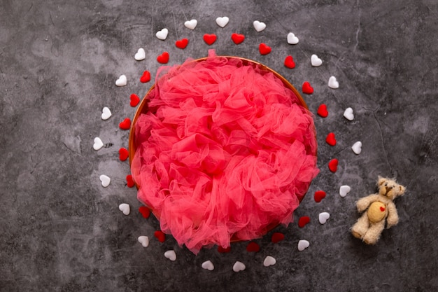 Newborn photography digital for a valentine's day, red and white hearts and a bowl