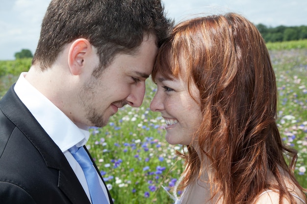 Newly lovely wedding couple happy in the country